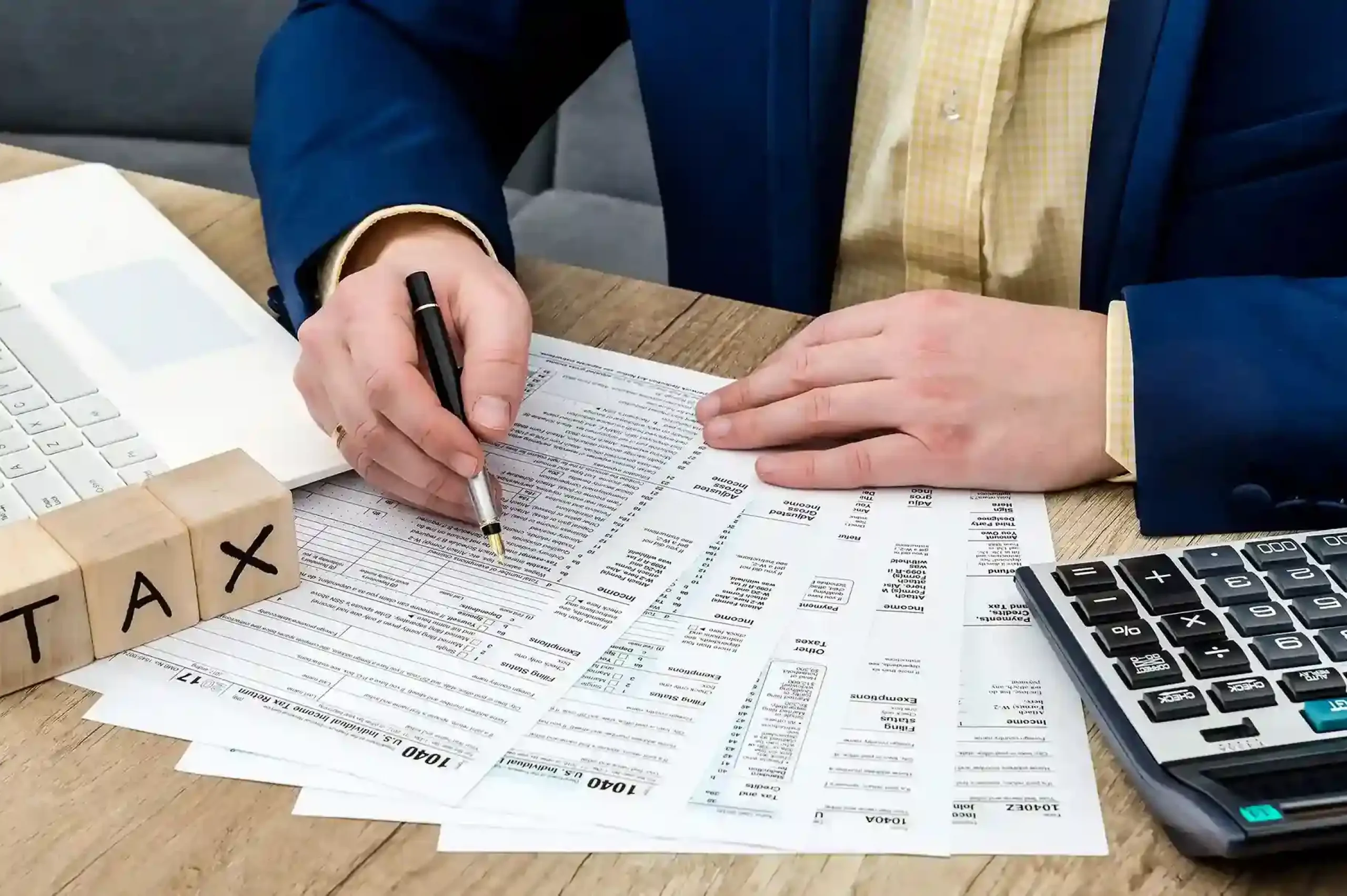 tax-time-male-hands-filling-1040-form_11zon